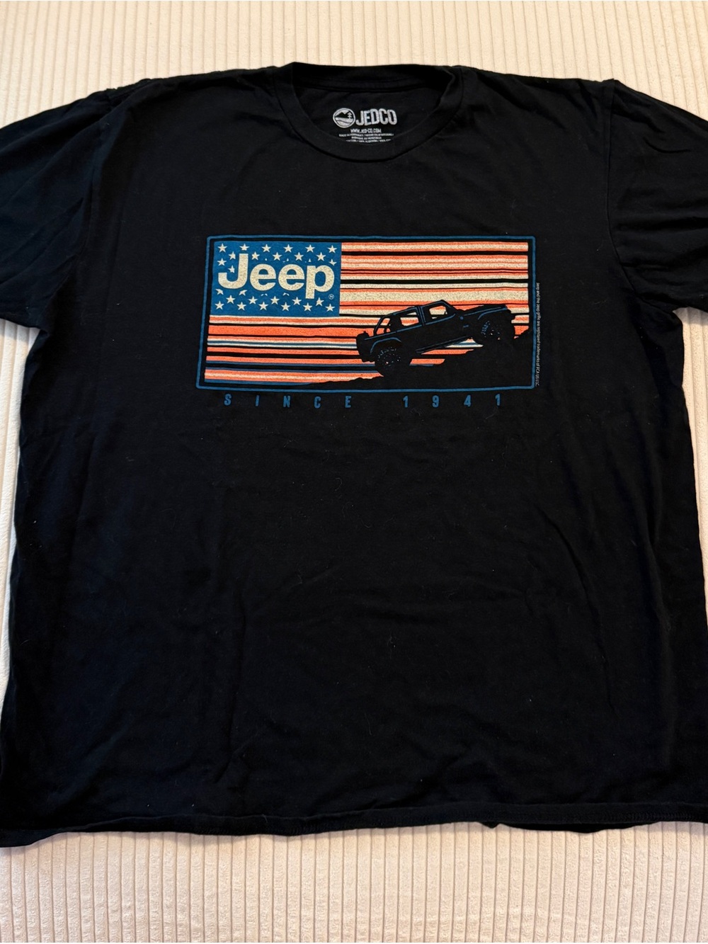 Jeep Black Short Sleeve Graphic Tee with Red & Blue Flag Design
